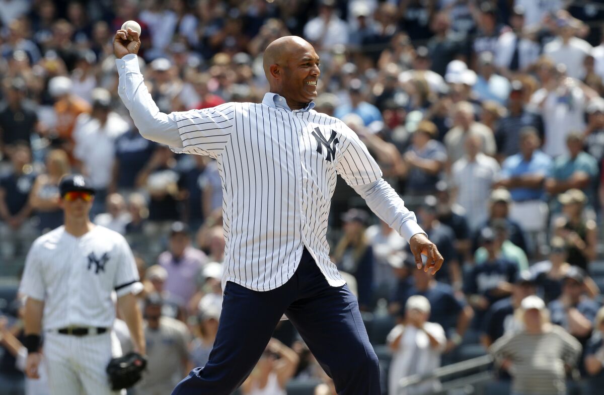 NEW YORK, NEW YORK - AUGUST 17: 2019 National Baseball Hall of Fame inductee and former New York Yankee Mariano Rivera throws the ceremonial first pitch before a game between the Yankees and the Cleveland Indians at Yankee Stadium on August 17, 2019 in New York City. (Photo by Jim McIsaac/Getty Images) ** OUTS - ELSENT, FPG, CM - OUTS * NM, PH, VA if sourced by CT, LA or MoD **