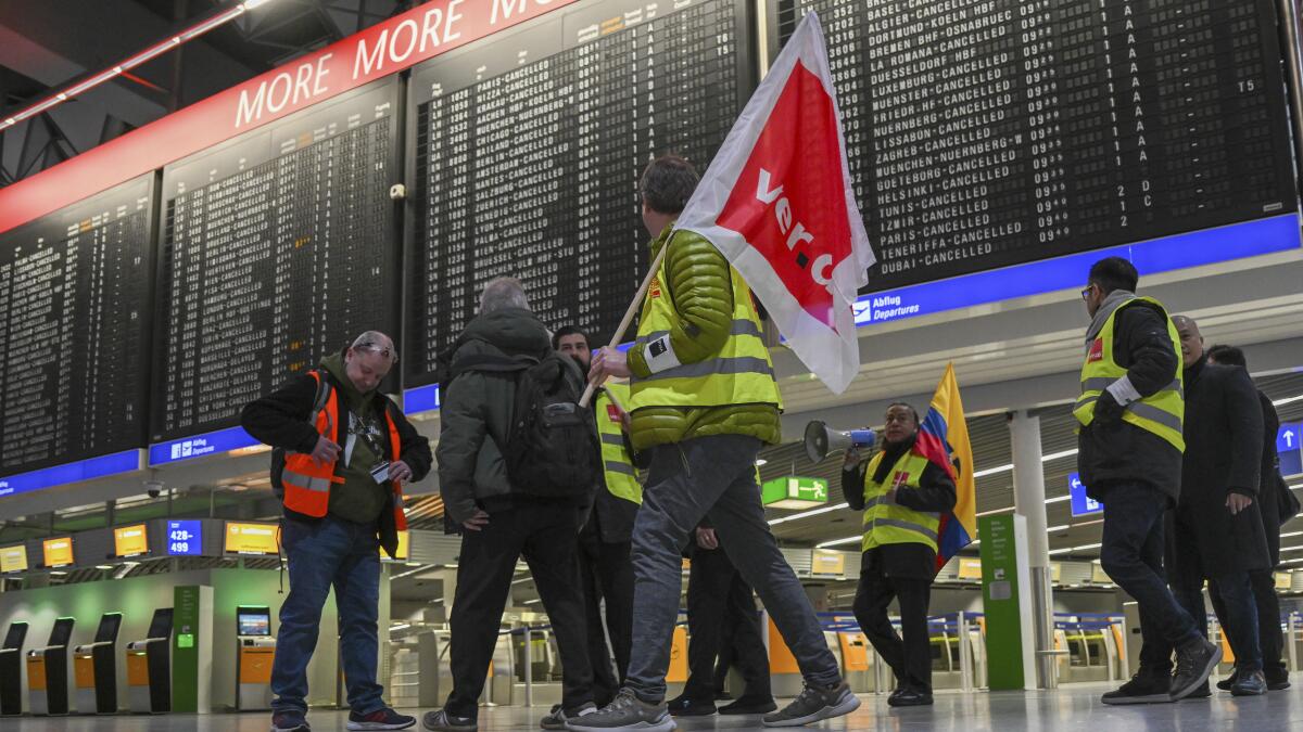 warehouse workers go on strike in Germany over Covid-19