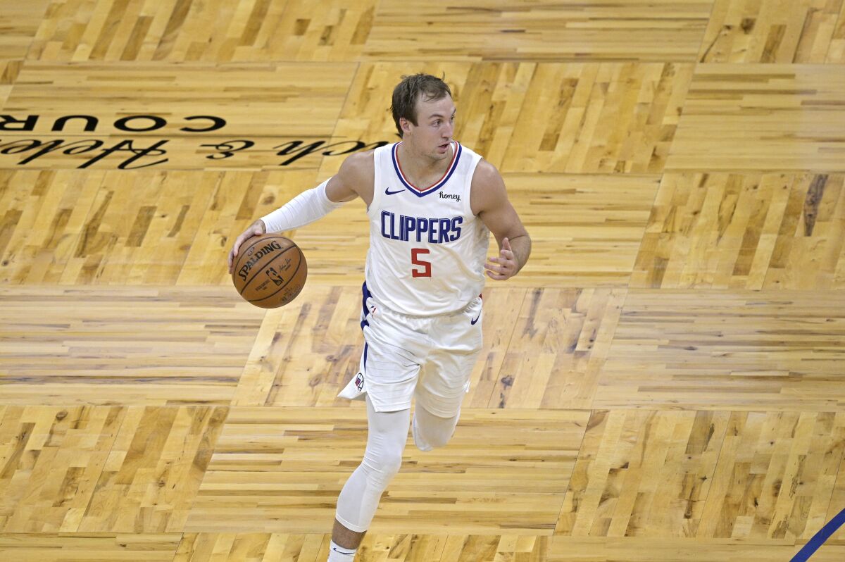 Clippers guard Luke Kennard controls the ball during a win over the Orlando Magic on Friday.