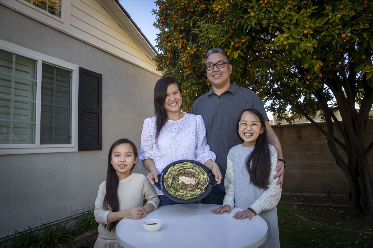 The Lee family enjoys Mille Feuille nabe, a Japanese stew.