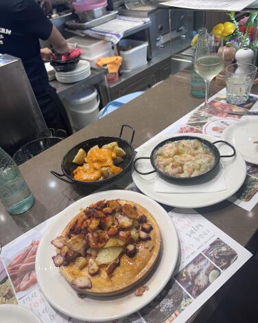 Pulpo and patatas bravas.