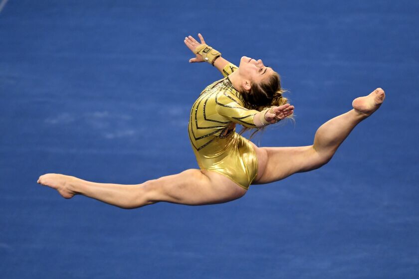 UCLA's Pauline Tratz competes in the floor event against BYU at Pauley Pavilion on Feb. 10, 2021.