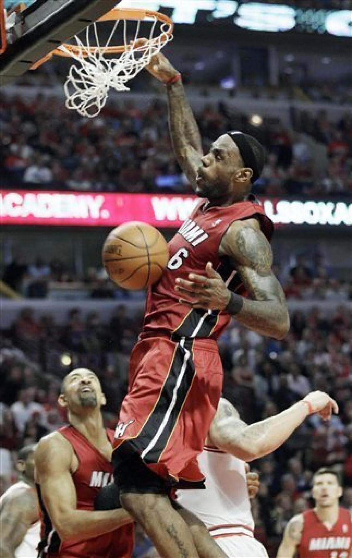 LeBron James leads Miami Heat over Chicago Bulls, 85-75, tying