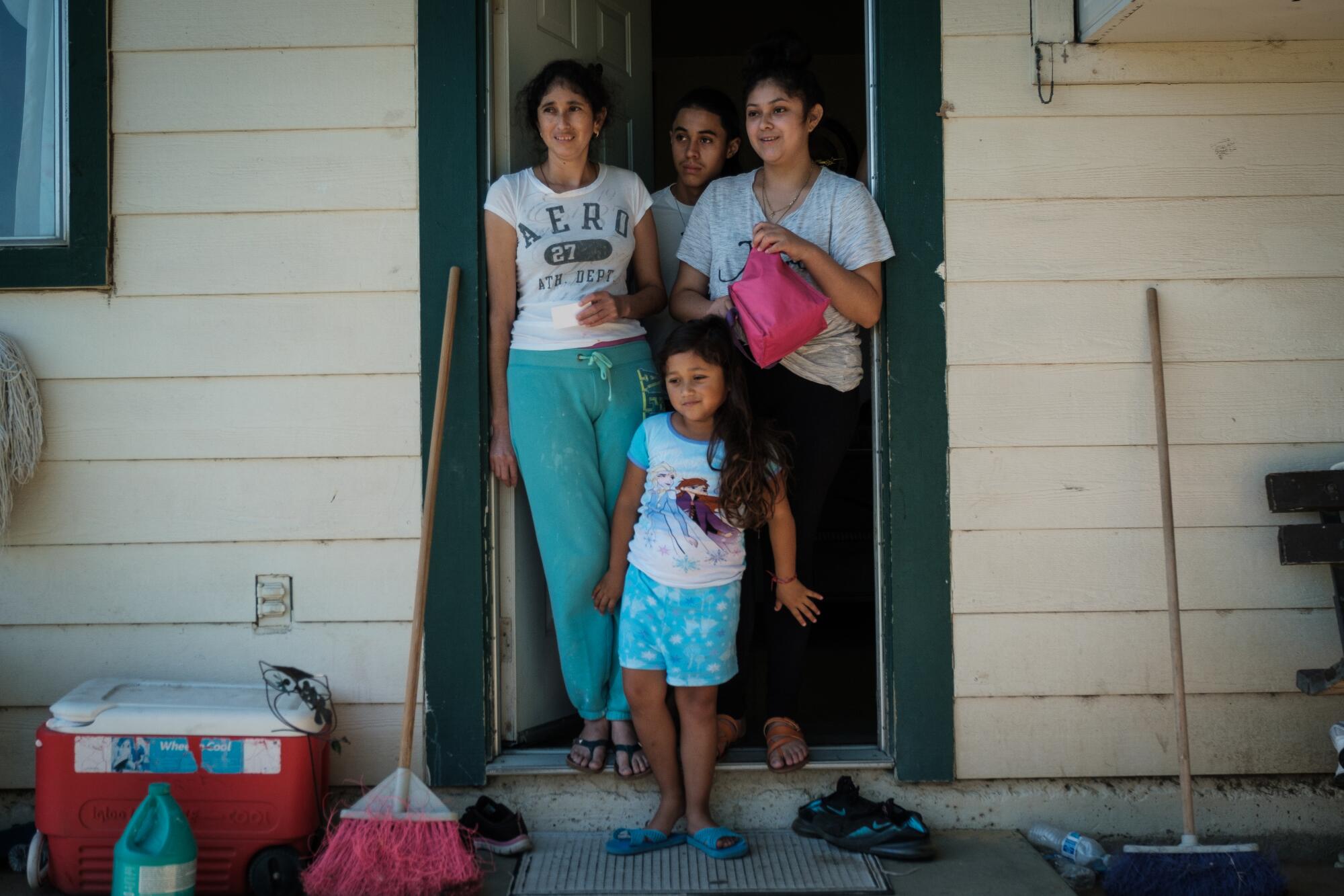 From left, siblings Carla, Samuel and Citlati Mendoza and their niece, Mila Gros 