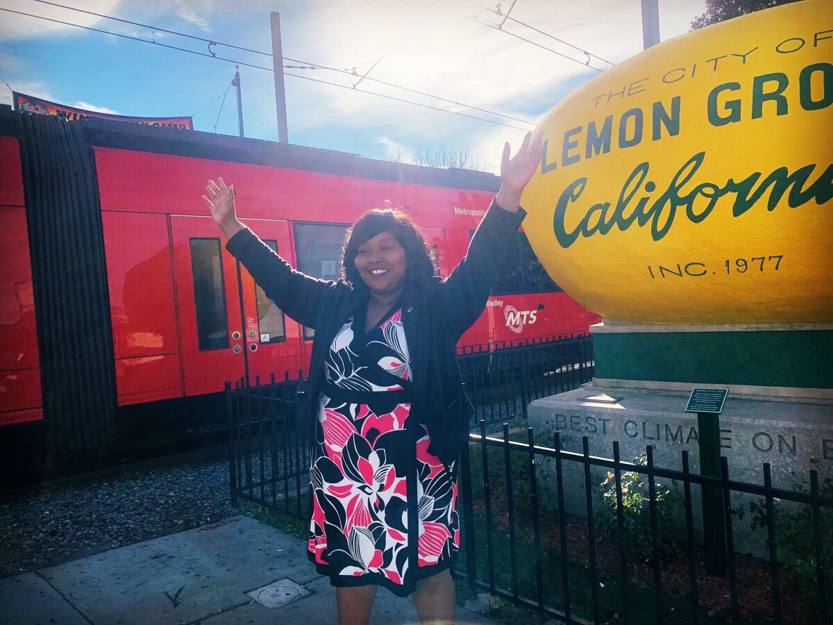 Lemon Grove Mayor Racquel Vasquez in front of the city's iconic lemon.