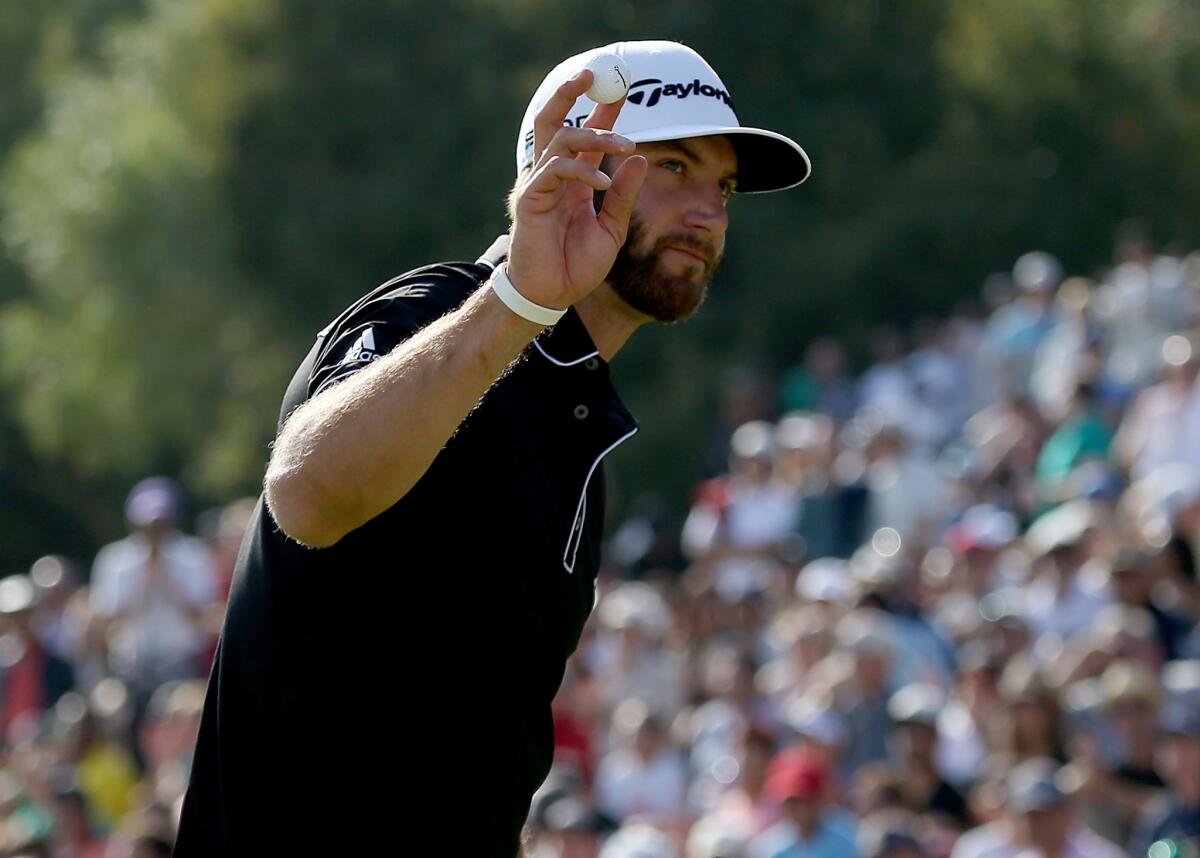 Dustin Johnson, shown at the Northern Trust Open on Feb. 16, is on leave from the PGA Tour for "personal reasons."