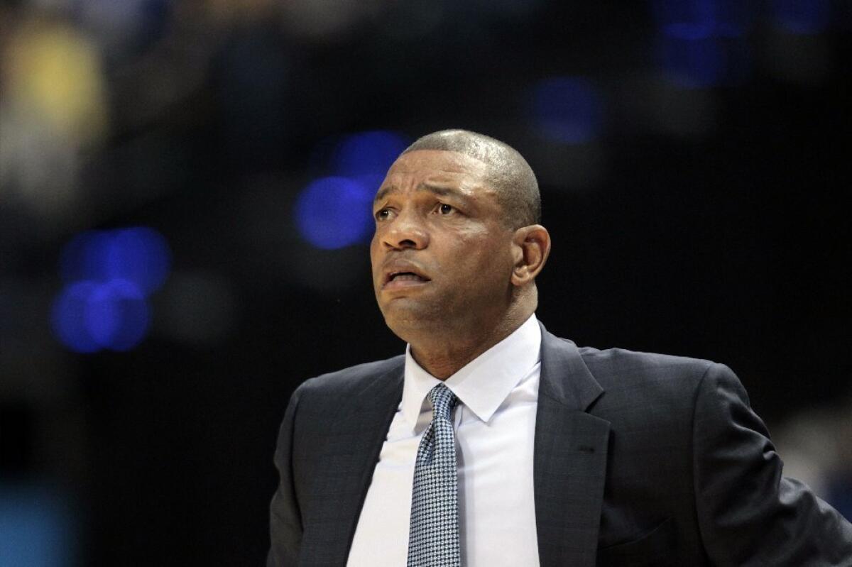 Clippers Coach Doc Rivers watches from the sidelines on Saturday.