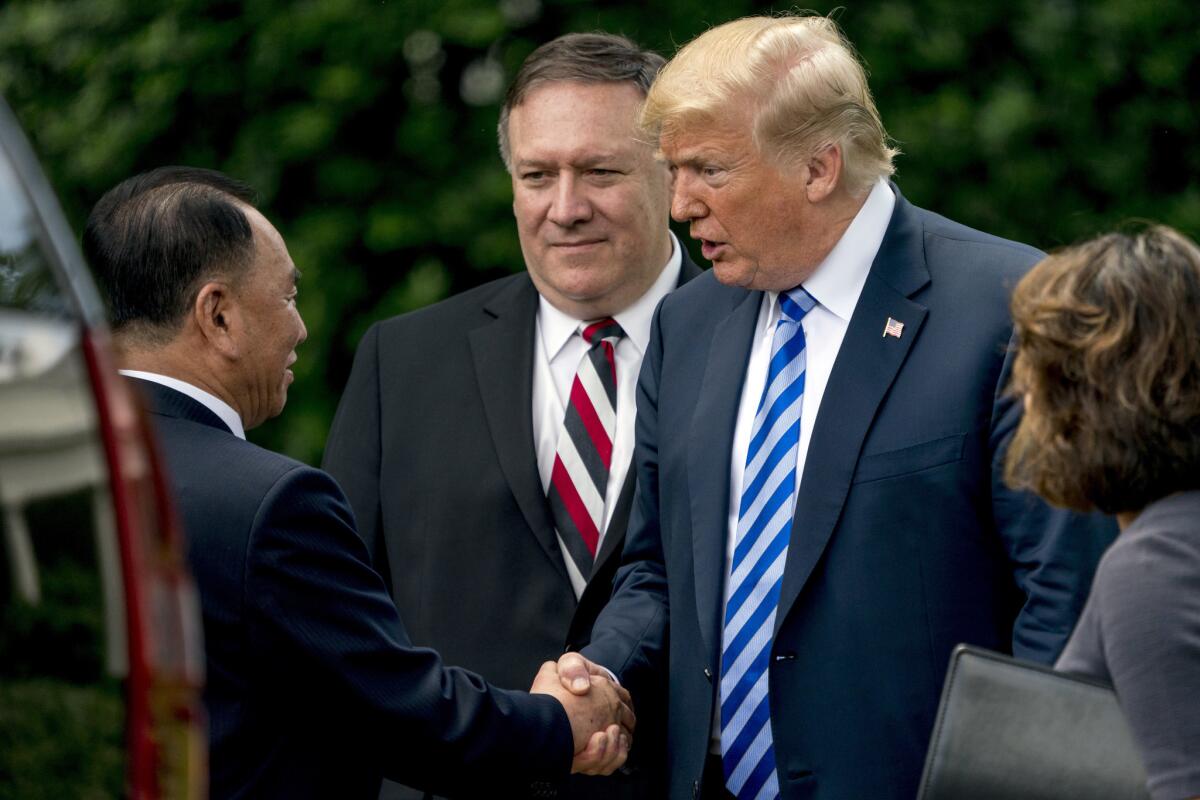 President Trump shakes hands with North Korean envoy Kim Yong Chol after a June 1 meeting at the White House.