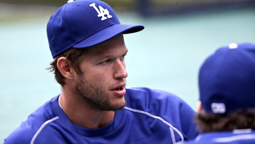 Dodgers starting pitcher Clayton Kershaw stretches before a game against the Padres this season.