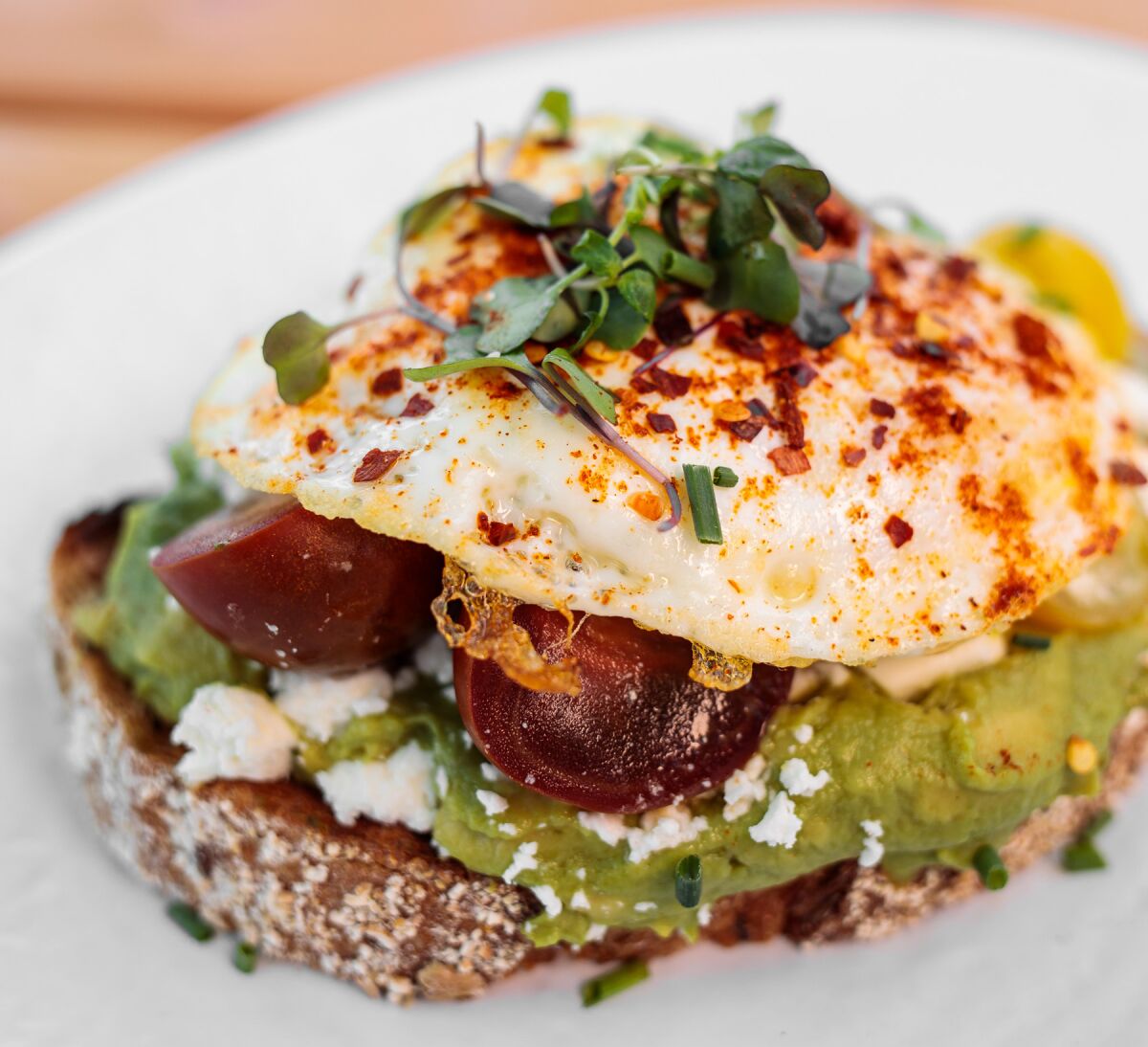 Loaded avocado toast at Mavericks Beach Club.