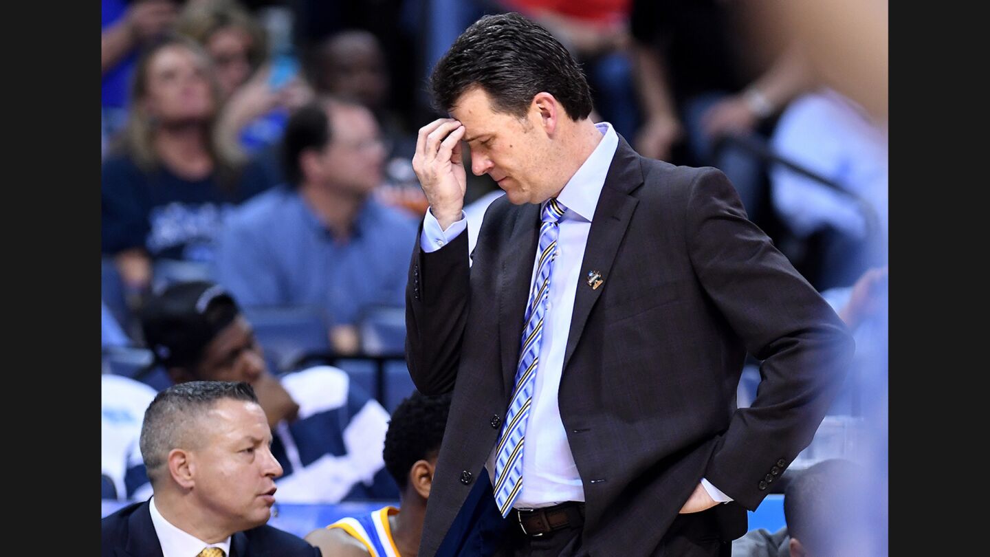 UCLA Coach Steve Alford looks away from the court after a Bruins turnover during a Sweet 16 game against Kentucky on March 24.