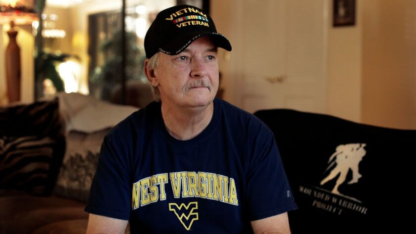 Michael Baughman, at his home in Danville, Calif., is among hundreds of Vietnam veterans who have been diagnosed with a rare form of cancer that may be linked to their time in the service.