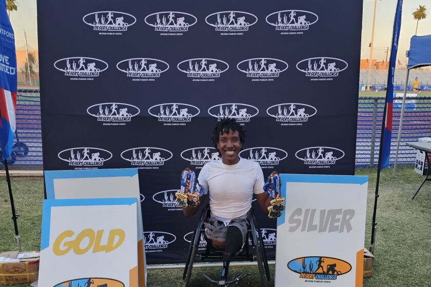 Josiah Ettore won gold medals in wheelchair races for 200 meters, 1,500 meters and 5,000 meters at Desert Challenge Games.