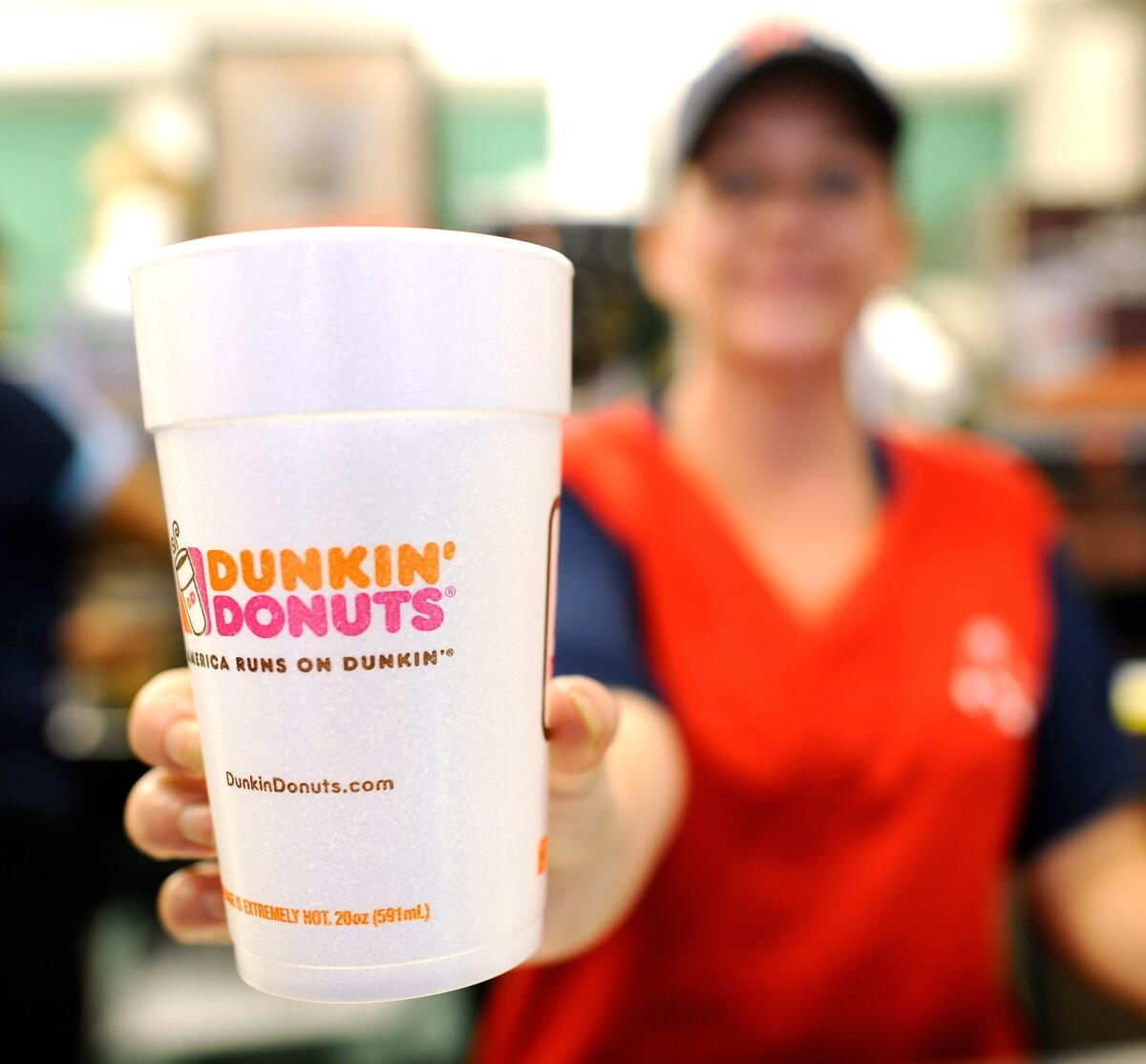 Dunkin' Donuts opened its first traditional store in the Southland in Santa Monica on Tuesday.
