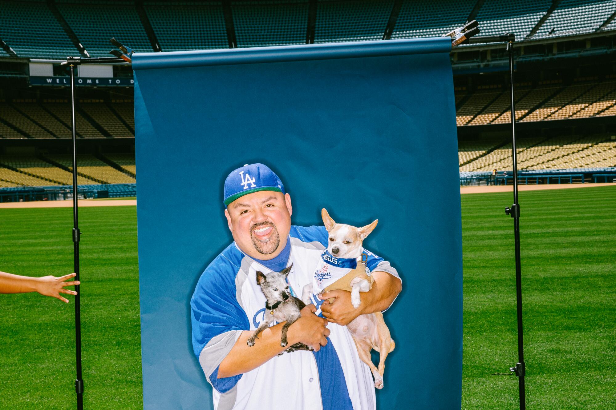 Comedian Gabriel Iglesias with his dogs