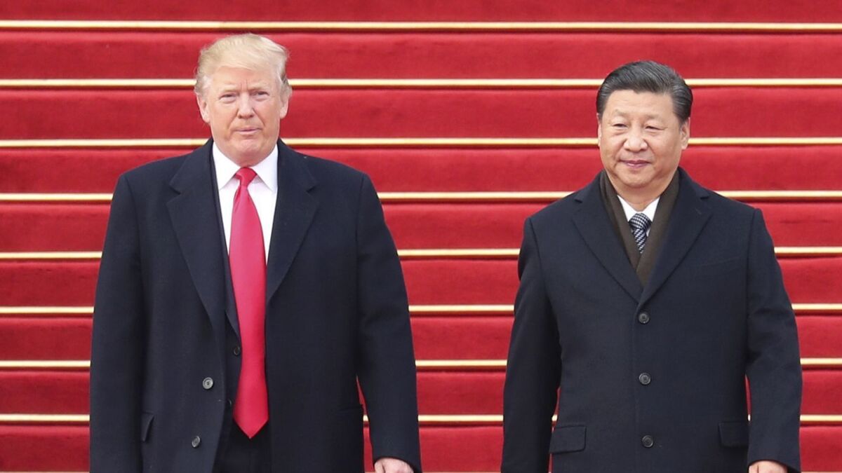 Chinese President Xi Jinping holds a ceremony to welcome President Trump in Beijing on Nov. 9, 2017. 