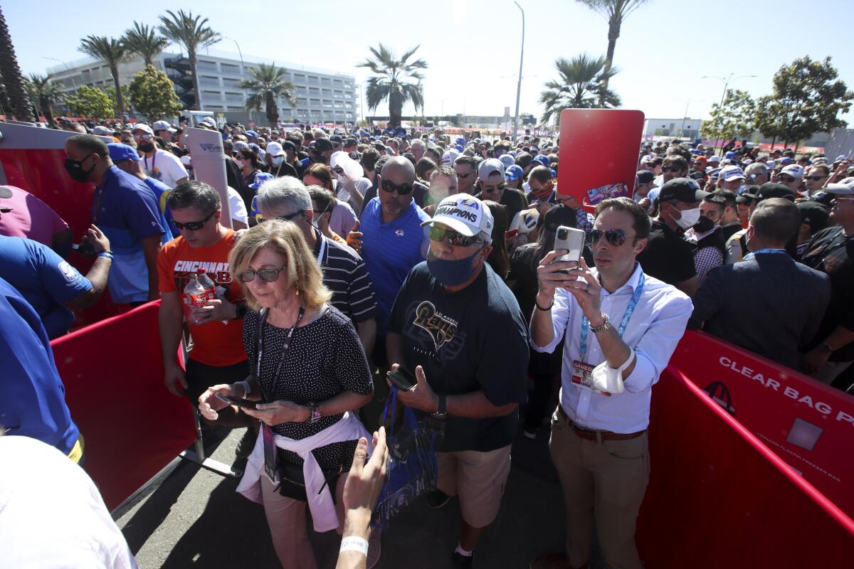 Fans line up to enter the grounds before the Super Bowl LVI at SoFi Stadium.