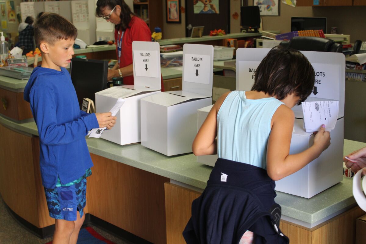 A student makes sure her vote counts.