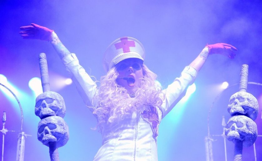Singer Maria Brink of the band In This Moment performs during the Carnival of Madness tour at The Joint inside the Hard Rock Hotel & Casino on September 15, 2013 in Las Vegas, Nevada.