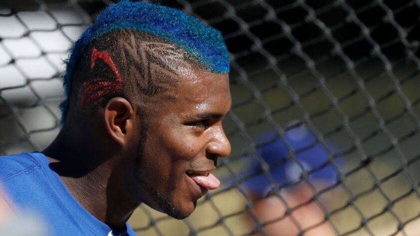 Dodgers outfielder Yasiel Puig sports a new dye job before the start of Game 2 of the World Series on Oct. 25.