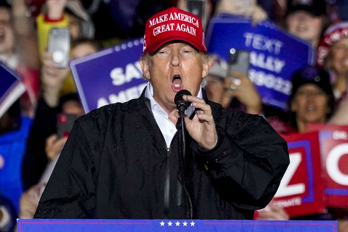 Former President Trump speaks at a campaign rally.