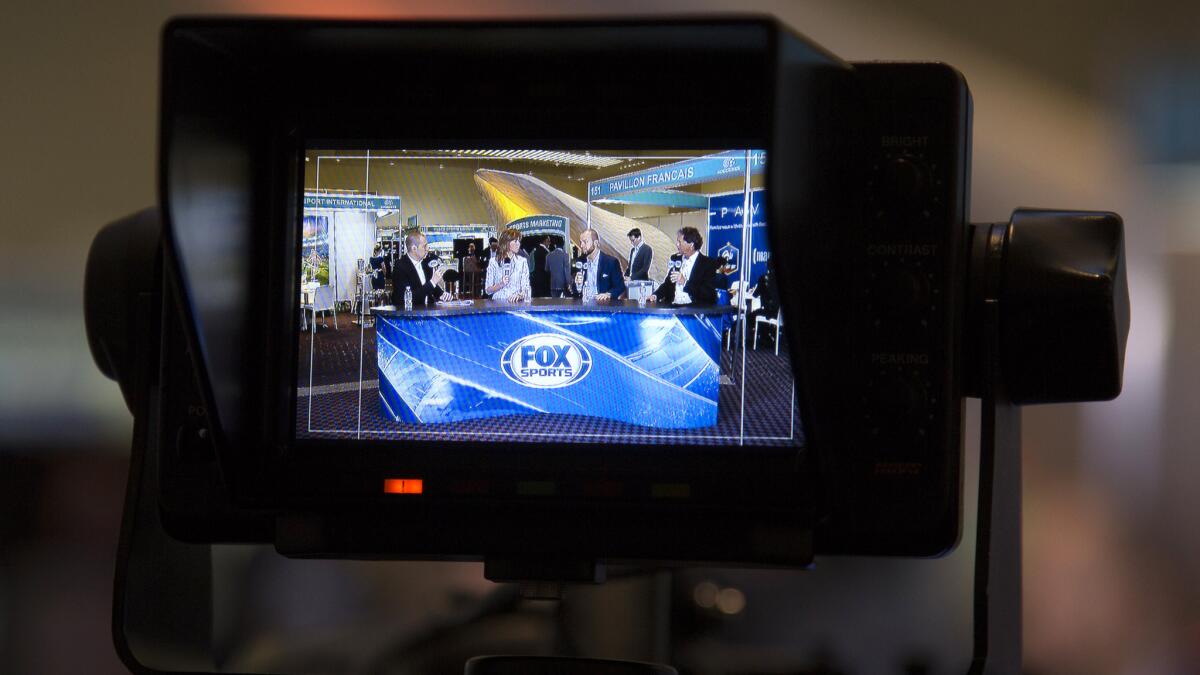 Fox Sports Mexico analysts discuss soccer during a show earlier this month.