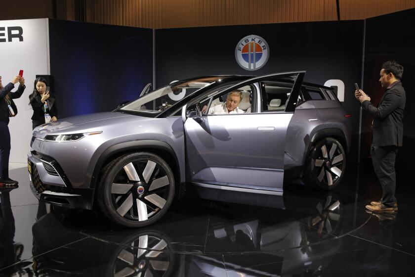 The Fisker Ocean electric SUV is on display at the Fisker booth during the CES tech show, Tuesday, Jan. 7, 2020, in Las Vegas. (AP Photo/John Locher)