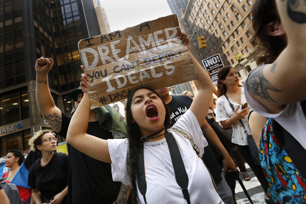 Protesters, including Dreamer Gloria Mendoza, gather at Trump Tower in New York to protest the announcement that President Trump will end the Deferred Action for Childhood Arrivals program.