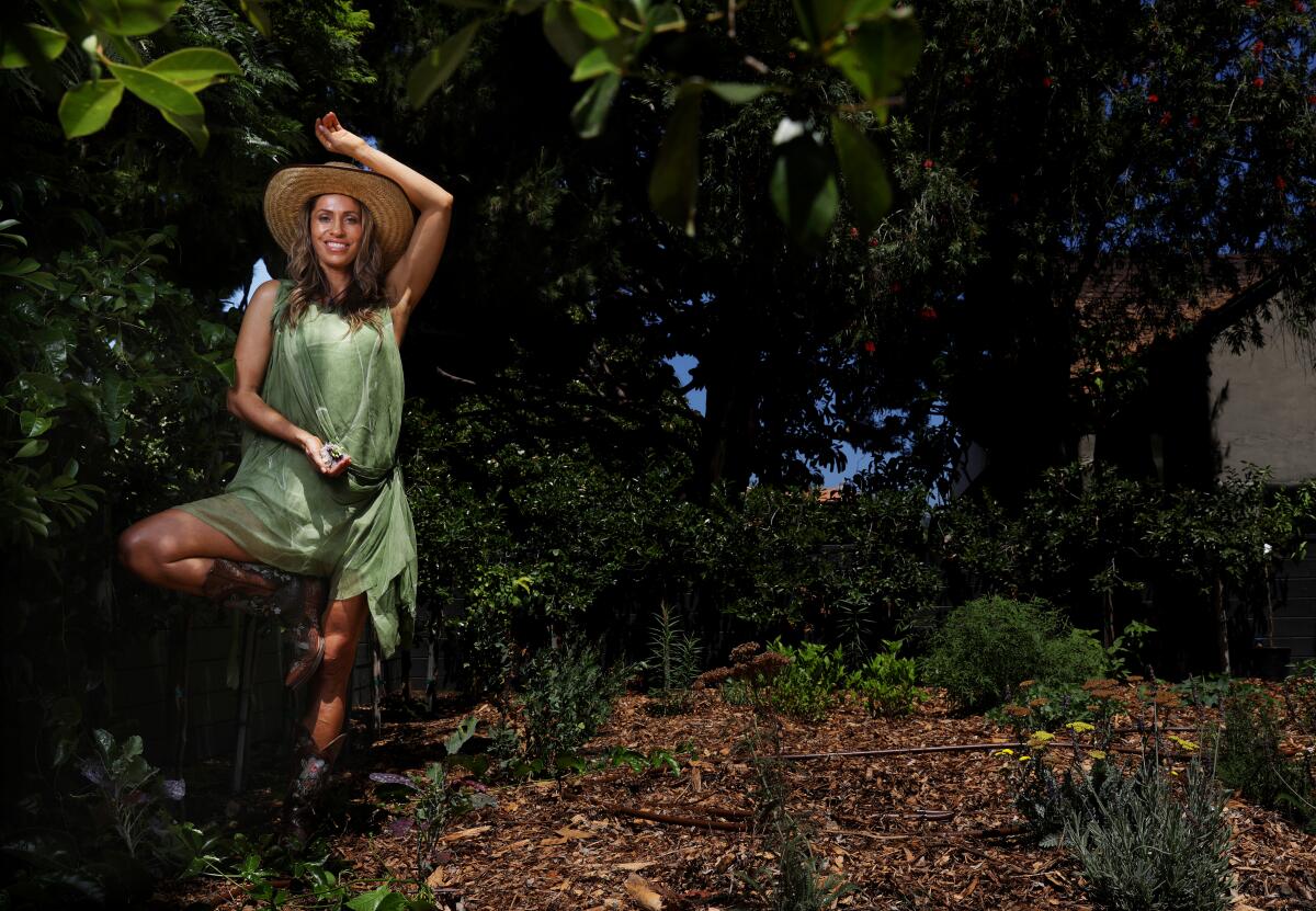 Instagram-famous wellness guru Rainbeau Mars in her Venice edible garden