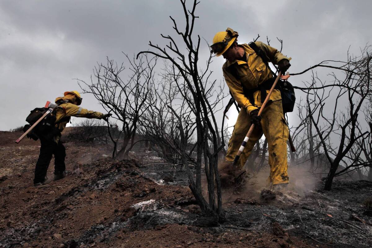 Crews battle the Springs fire in Ventura County last week.