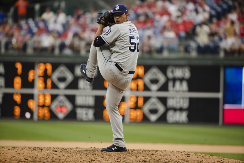 Padres rookie reliever Andres Munoz pitched a perfect eighth inning Sunday against the Philadelphia Phillies.