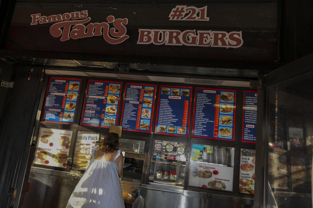 The order window at a Tam’s Burgers in Compton