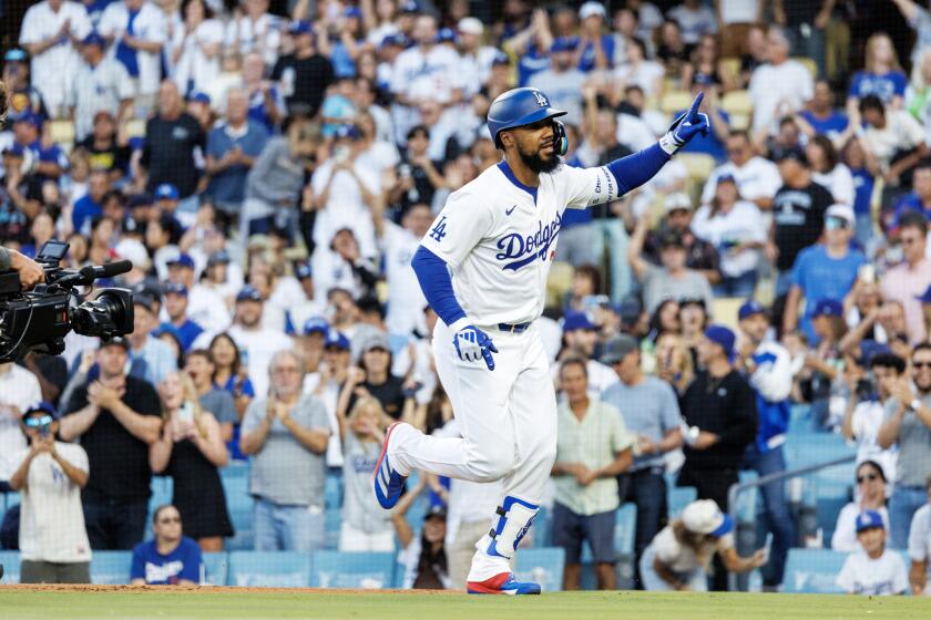 LOS ANGELES, CA - JULY 3, 2024: Los Angeles Dodgers outfielder Teoscar Hernandez (37) acknowledges the crowd after hitting a solo home-run in the first inning against the Arizona Diamondbacks at Dodgers Stadium on July 3, 2024 inLos Angeles, California.(Gina Ferazzi / Los Angeles Times)