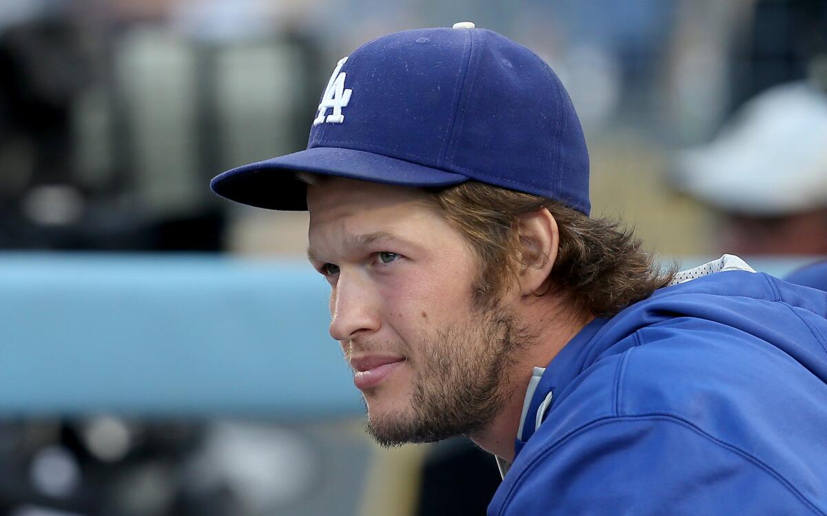 Dodgers pitcher Clayton Kershaw watches a July 29 game against the Oakland Athletics at Dodger Stadium.