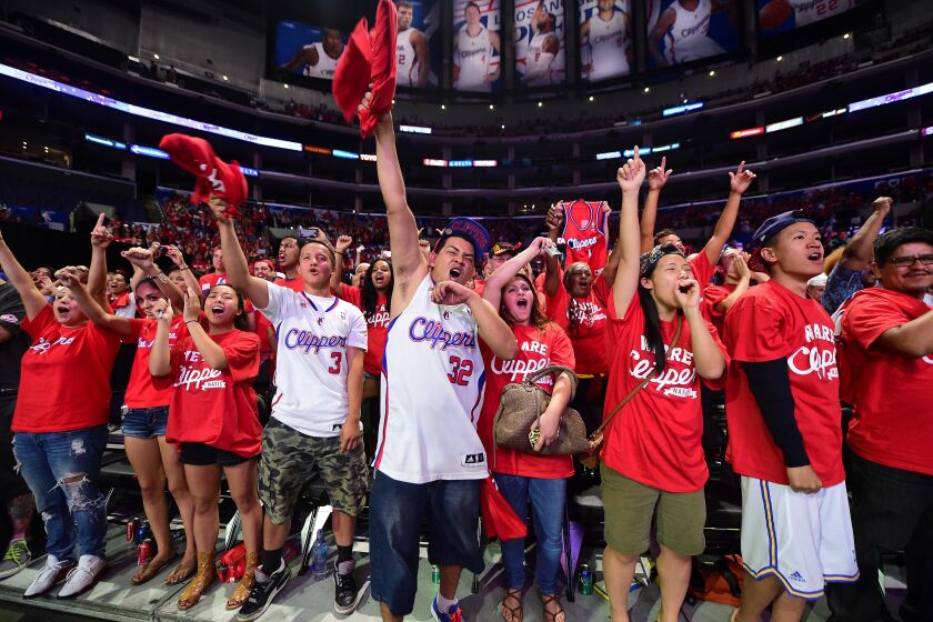 Fans react to introductions of players, the coach and Steve Ballmer, the new owner of the Los Angeles Clippers of the NBA on August 18, 2014 at Staples Center in Los Angeles, California, during the Clippers Fan Festival where the new owner was introduced. AFP/ PHOTO/Frederic J. BROWN (Photo credit should read FREDERIC J. BROWN/AFP/Getty Images)
