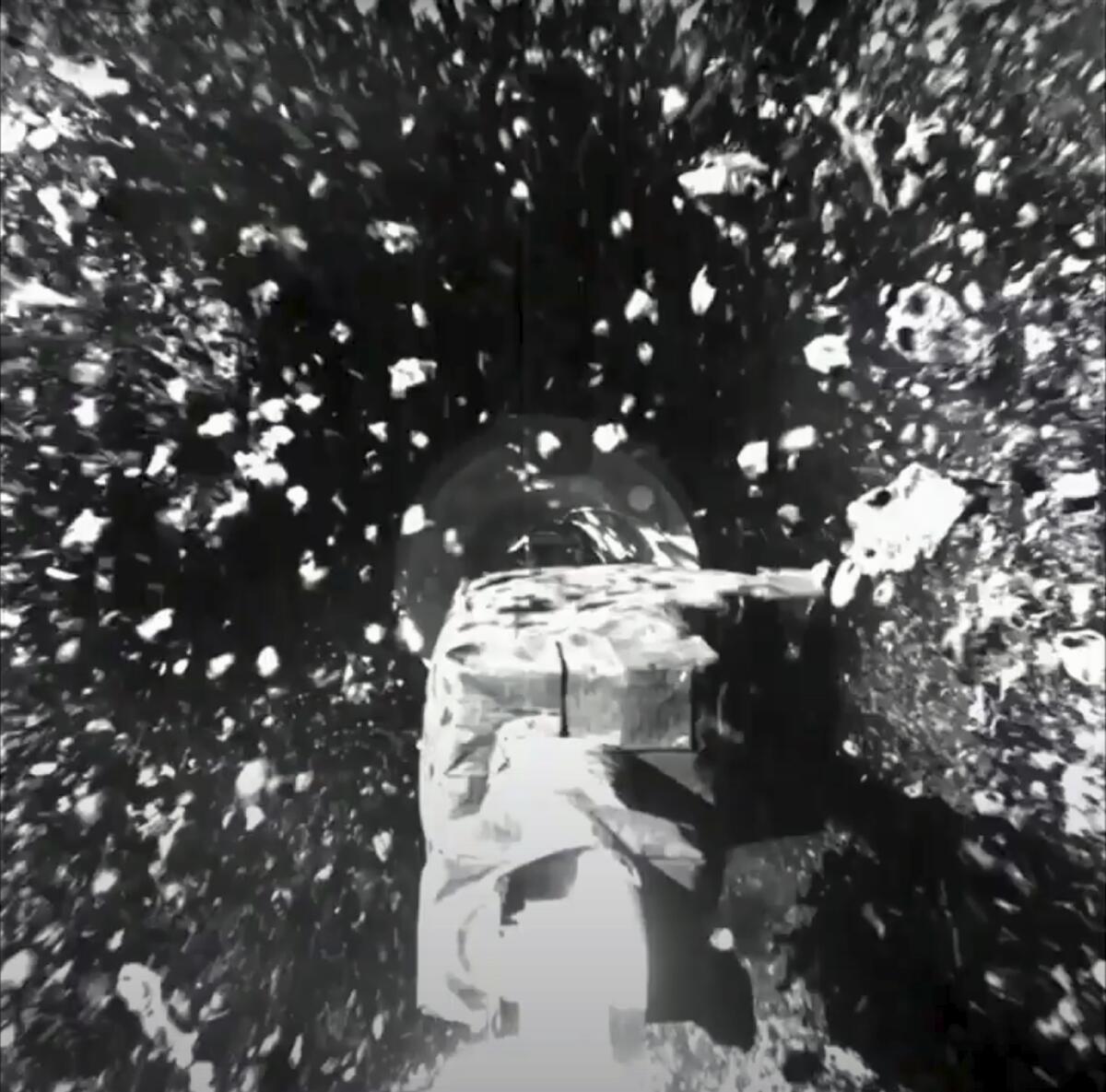 A view of a spacecraft amid floating debris 