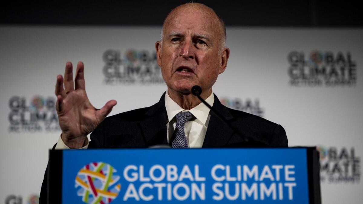Gov. Jerry Brown announces how states, cities and businesses are leading the U.S. to a low-carbon future on the first full day of the Global Climate Action Summit at the Moscone Center on Sept. 13 in San Francisco.