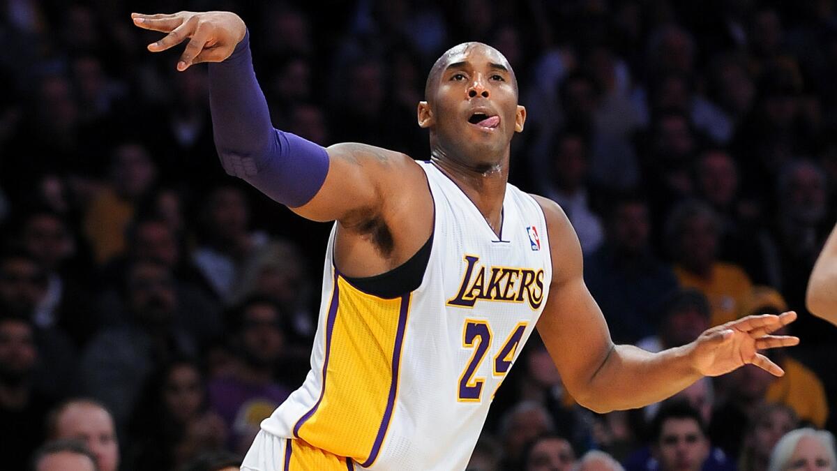 Lakers star Kobe Bryant sinks a shot during a game against Toronto in 2013. Bryant was limited to six games last season because of injuries.