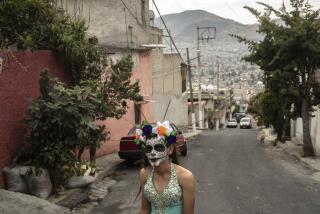 A woman walks on a street