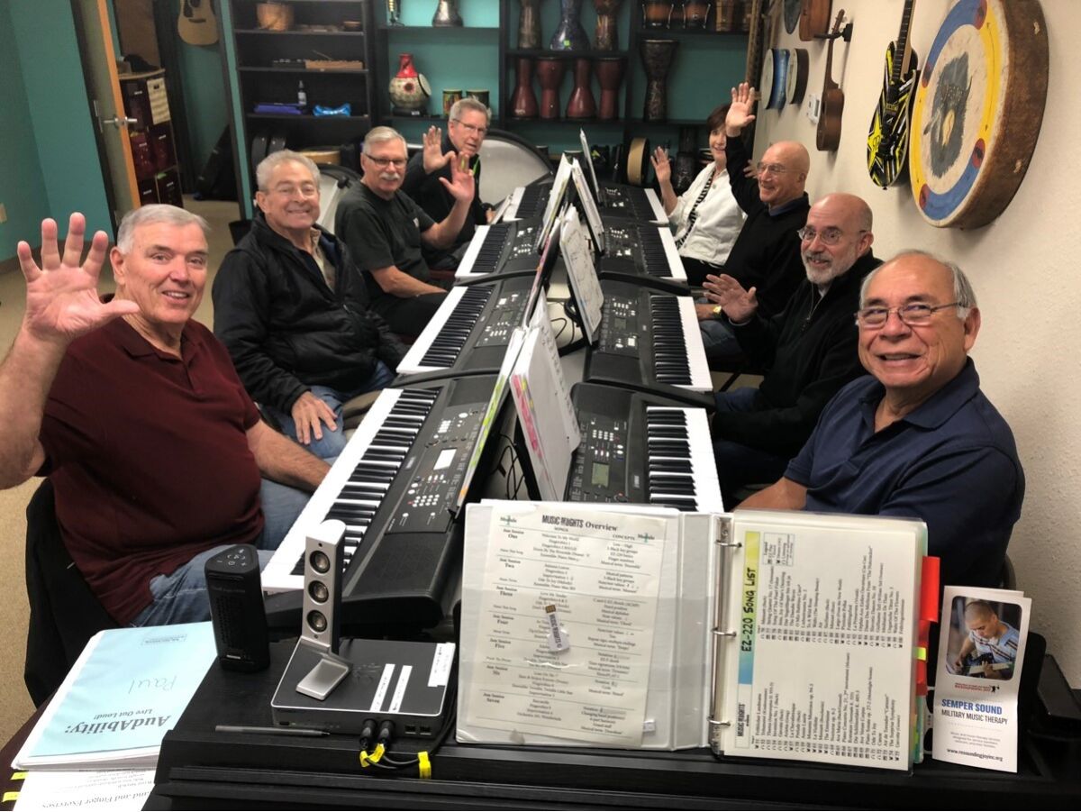 MusicWorx participants gather for a keyboard class.