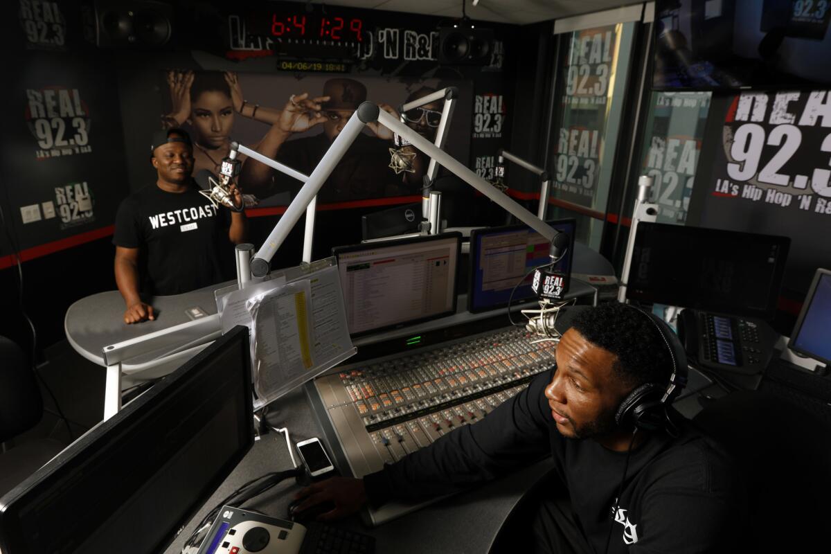 Home Grown Radio's Chuck Dizzle, right, and DJ Hed at iHeartRadio's Real 92.3 studio in Burbank.