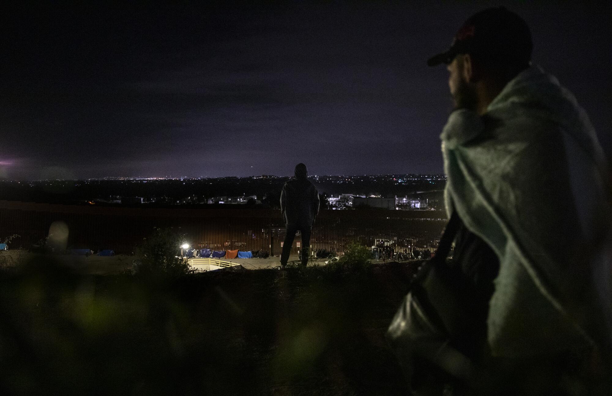 There was no discernible change at the border-wall encampment as Title 42 ended at 8:59 p.m. Thursday