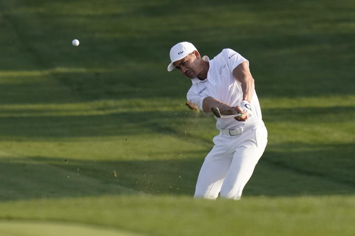Camilo Villegas, of Colombia, hits from the fairway on the eighth hole during the first round of the Texas Open golf tournament, Thursday, April 1, 2021, in San Antonio. (AP Photo/Eric Gay)
