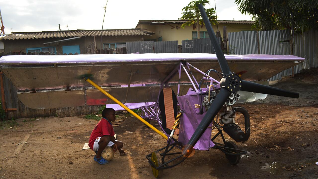 Eight years after Gabriel Nderitu started work on Project One, his first attempt to build a plane, Project 14 stands like a creation from a child’s Meccano set: painted purple, with yellow wooden wheels and a red wooden control panel and the kind of plastic switches used to turn on lights in houses.