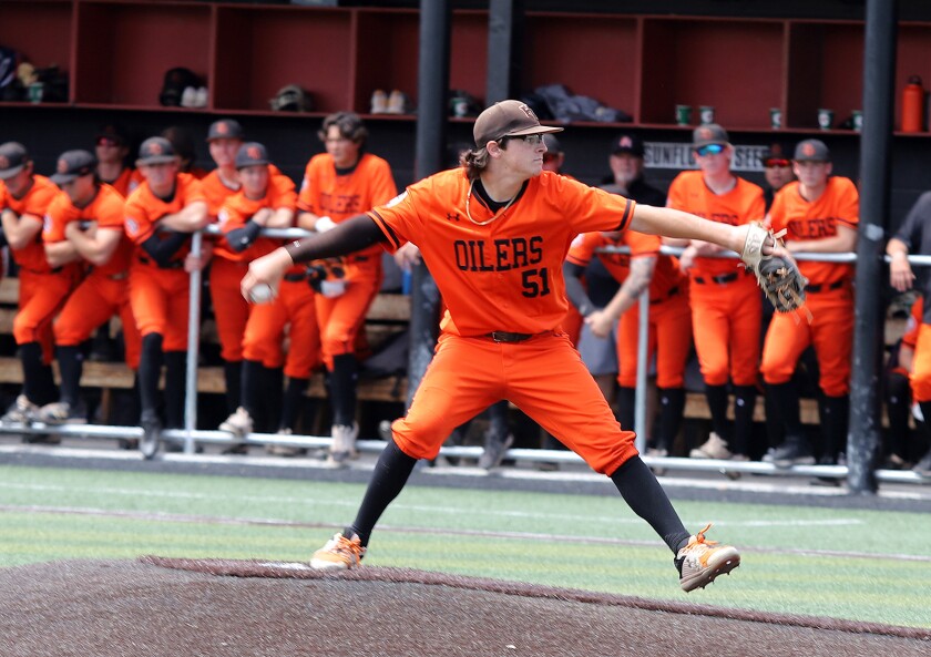 Huntington Beach's Matthew Lopez (51) pitches against JSerra on Saturday.