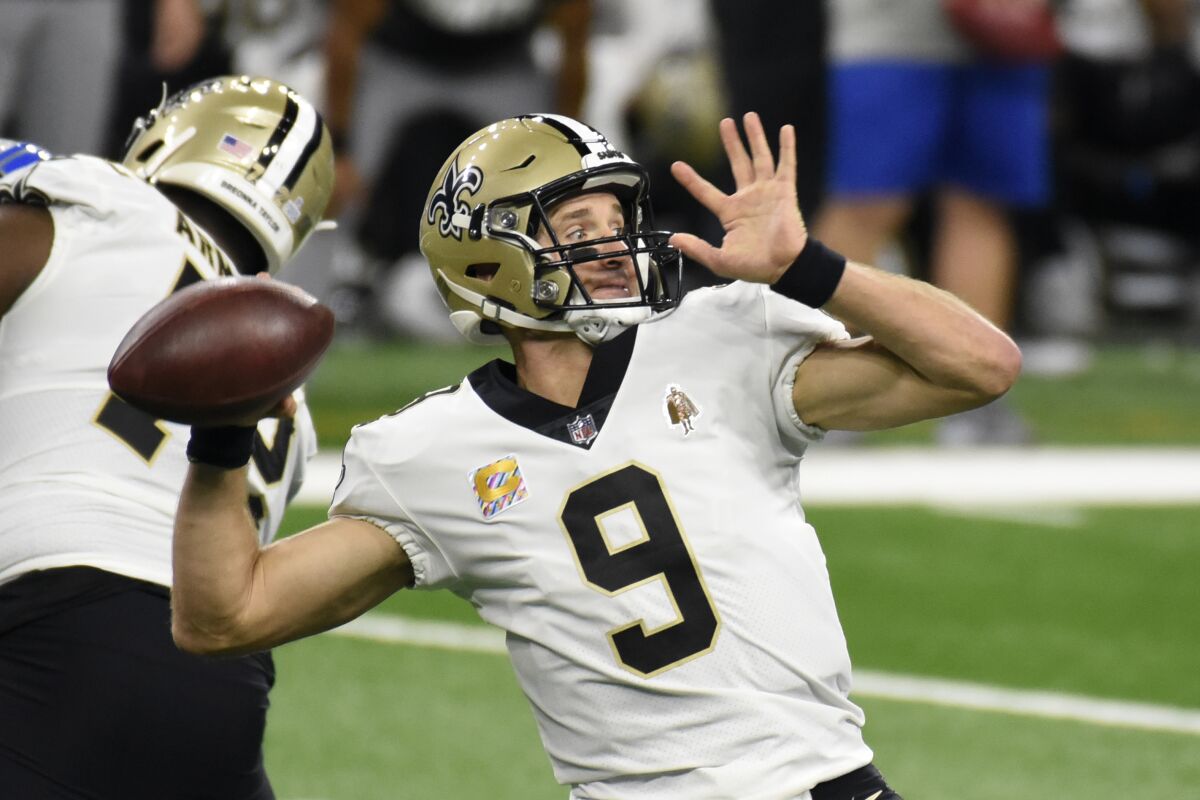 New Orleans Saints quarterback Drew Brees throws during the first half of an NFL football game against the Detroit Lions, Sunday, Oct. 4, 2020, in Detroit. (AP Photo/Jose Juarez)