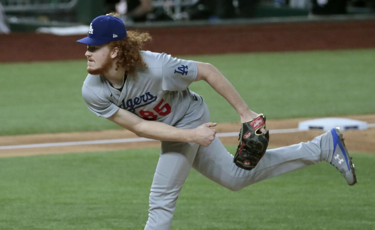 The Dodgers' Dustin May pitches in Game 5 of the NLCS.