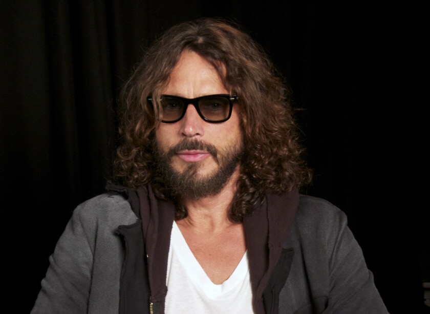 FILE - This Sept. 23, 2011 file photo shows musician Chris Cornell in New York. The family of Chris Cornell and a doctor who they alleged over-prescribed him drugs before he died have agreed to a settle a lawsuit. Documents filed in Los Angeles court by attorneys for the rock singer’s widow and their children said a confidential settlement had been reached. The documents were filed in April, but had gone unnoticed before City News Service reported on them Thursday, May 6, 2021. (AP Photo/John Carucci, File)