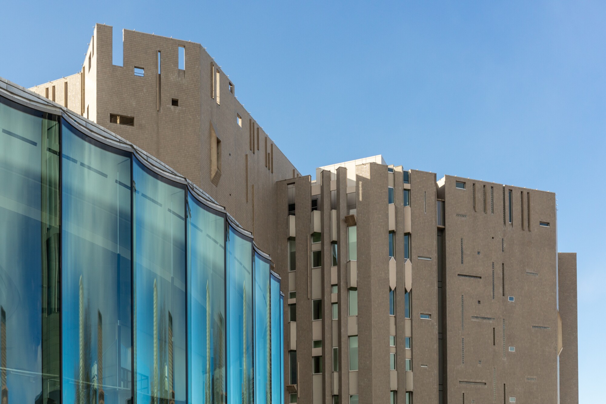 The Denver Art Museum campus is seen from above in the middle of the day.