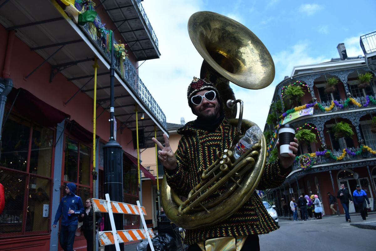 Musician Jason Jurzak, royal Street, New Orleans. (Christopher Reynolds / Los Angeles Times)